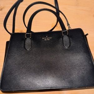 Used Beautiful Kate Spade purse. In black